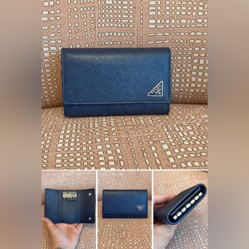 Prada saffiano leather key case in rich navy blue with signature triangle logo.